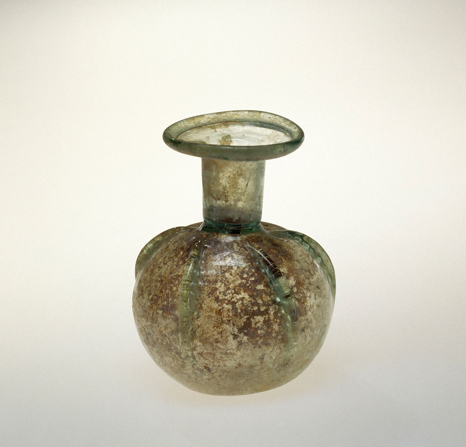 Mottled green-brown, rounded glass vase with a broad rim and narrow neck, showing signs of age